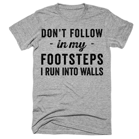 Don't follow in my footsteps i run into walls t-shirt