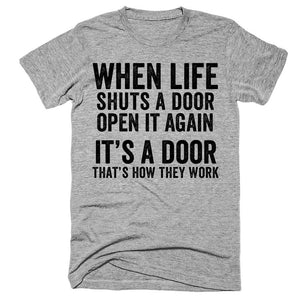 When life shuts a door Open it again It's a door That's how they work t-shirt